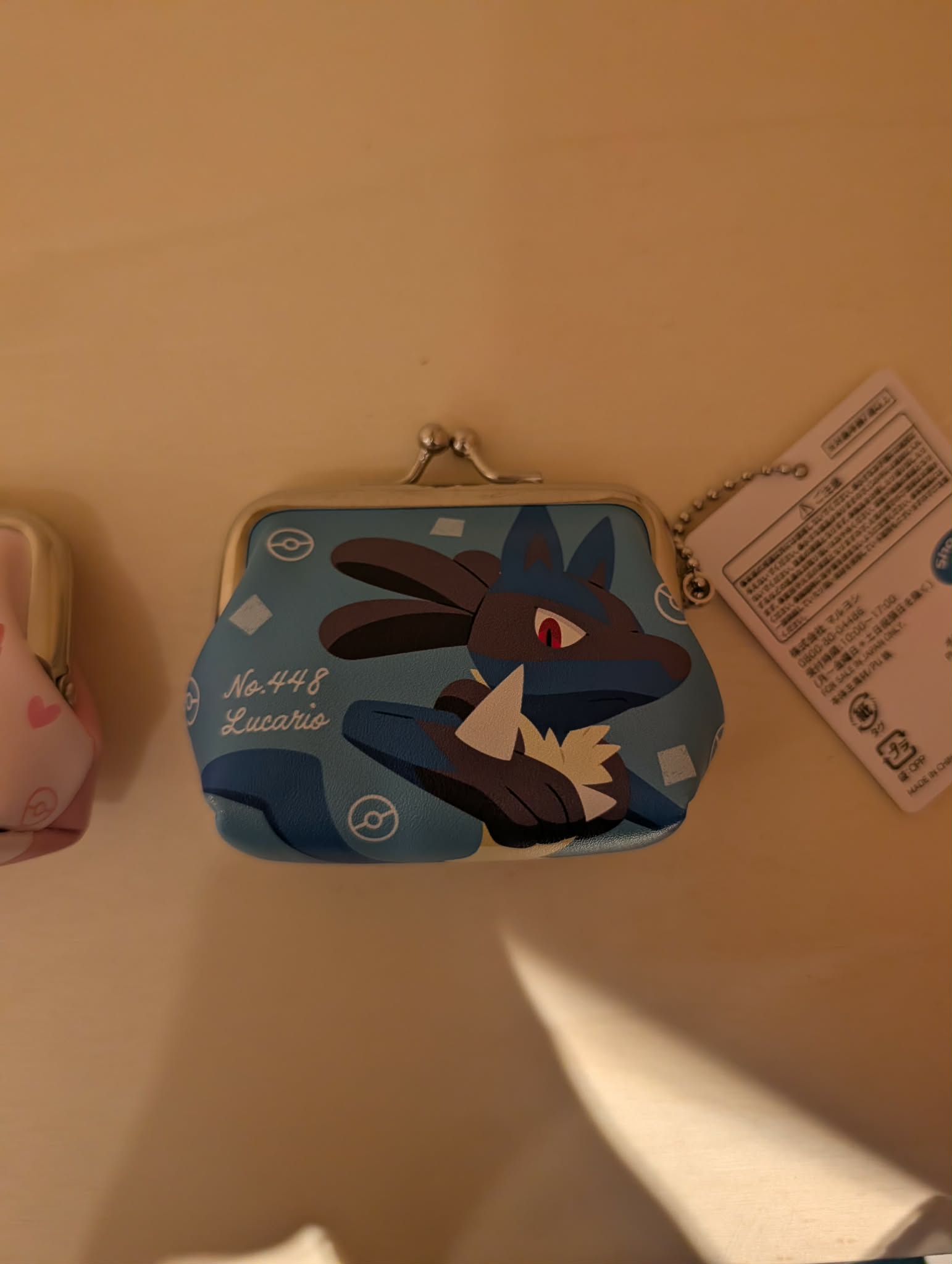 porte monnaie lucario pas