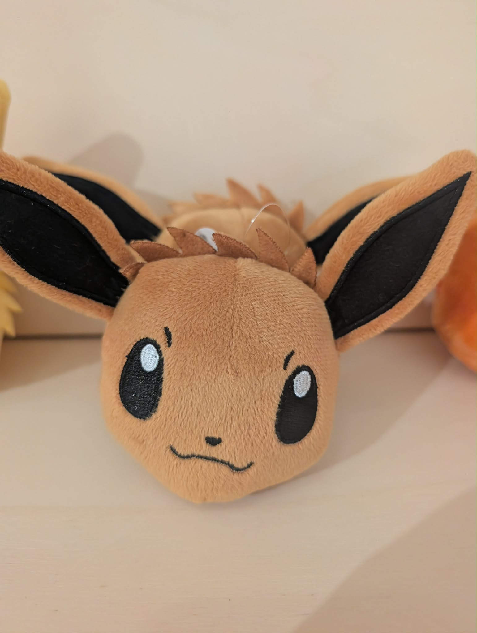 porte cle peluche evoli pas